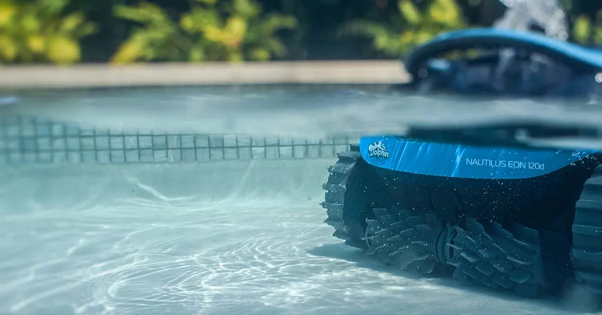 A Dolphin robot cleaning a pool floor